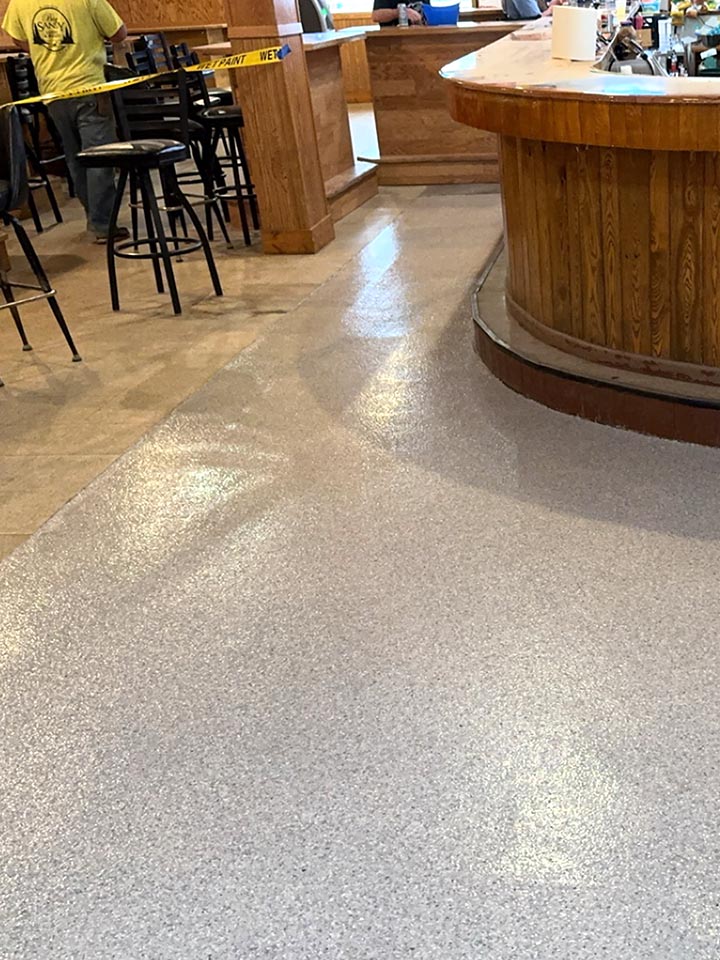 Commercial bar and restaurant with light flake floor coating